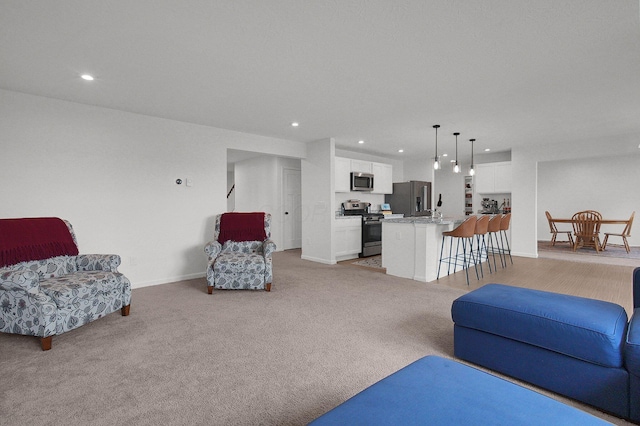 120 Heron Ave, Pataskala, OH 43062 - living room featuring recessed lighting and light colored carpet