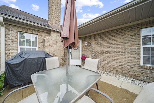 305 Pointe Pl Unit 12, Westerville, OH 43082 - view of patio featuring outdoor dining area and area for grilling