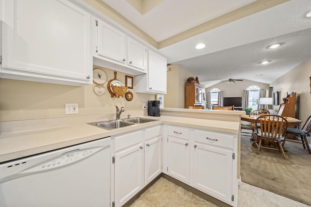 305 Pointe Pl Unit 12, Westerville, OH 43082 - kitchen featuring white dishwasher, a sink, a peninsula, vaulted ceiling, and a ceiling fan