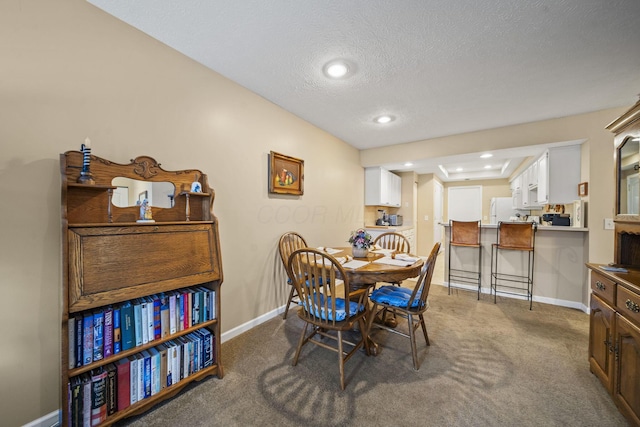 305 Pointe Pl Unit 12, Westerville, OH 43082 - carpeted dining room with baseboards, recessed lighting, and a textured ceiling