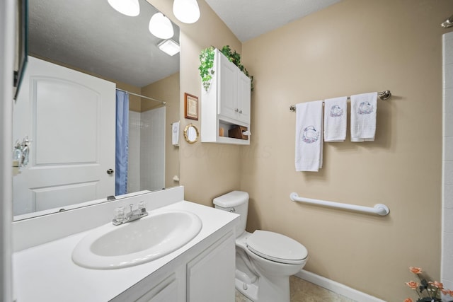 305 Pointe Pl Unit 12, Westerville, OH 43082 - full bathroom featuring toilet, vanity, a shower with shower curtain, baseboards, and tile patterned flooring