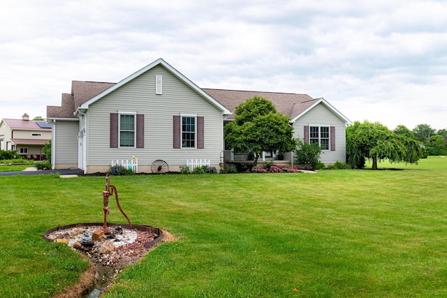 4091 Township Road 21, Marengo, OH 43334 - view of front of house with a front lawn and a shingled roof