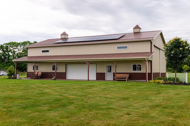 4091 Township Road 21, Marengo, OH 43334 - rear view of property featuring roof mounted solar panels and metal roof