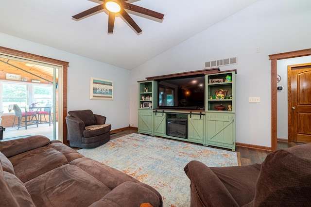 4091 Township Road 21, Marengo, OH 43334 - living room featuring wood finished floors, a ceiling fan, baseboards, and high vaulted ceiling