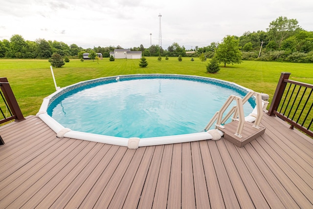 4091 Township Road 21, Marengo, OH 43334 - view of swimming pool featuring a wooden deck and a yard