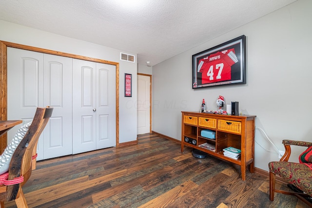 4091 Township Road 21, Marengo, OH 43334 - home office featuring wood finished floors, baseboards, and a textured ceiling