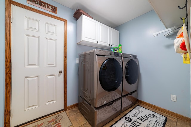4091 Township Road 21, Marengo, OH 43334 - laundry area featuring cabinet space, washer and clothes dryer, and baseboards