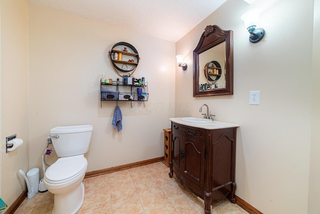4091 Township Road 21, Marengo, OH 43334 - bathroom featuring vanity, toilet, baseboards, and tile patterned floors
