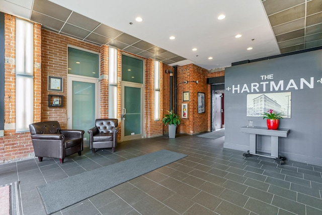 150 E Main St Unit 405, Columbus, OH 43215 - lobby featuring brick wall