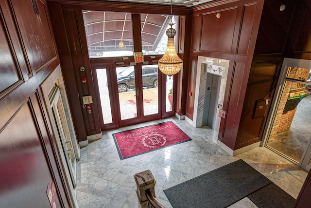 150 E Main St Unit 405, Columbus, OH 43215 - foyer featuring french doors and light marble finish floors