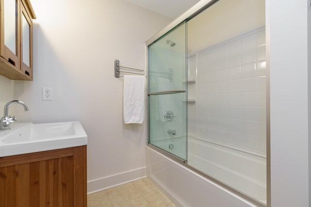 150 E Main St Unit 405, Columbus, OH 43215 - bathroom with tile patterned floors, combined bath / shower with glass door, and vanity