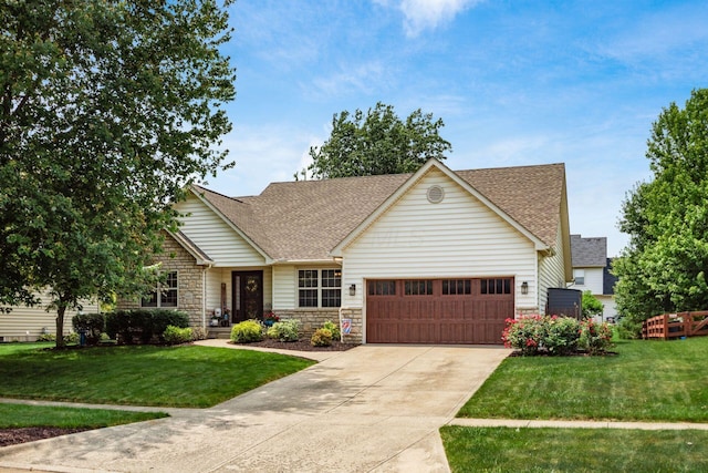 2461 Abbey Knoll Dr, Lewis Center, OH 43035 - view of front of property featuring roof with shingles, an attached garage, stone siding, and a front yard