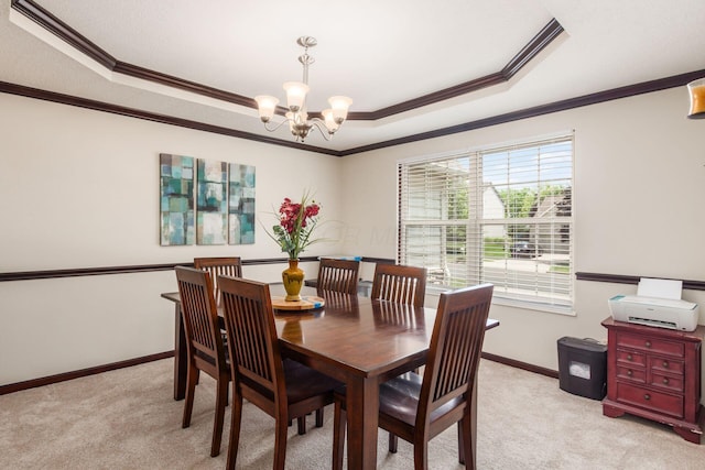 2461 Abbey Knoll Dr, Lewis Center, OH 43035 - dining room featuring a chandelier, a tray ceiling, light carpet, and crown molding