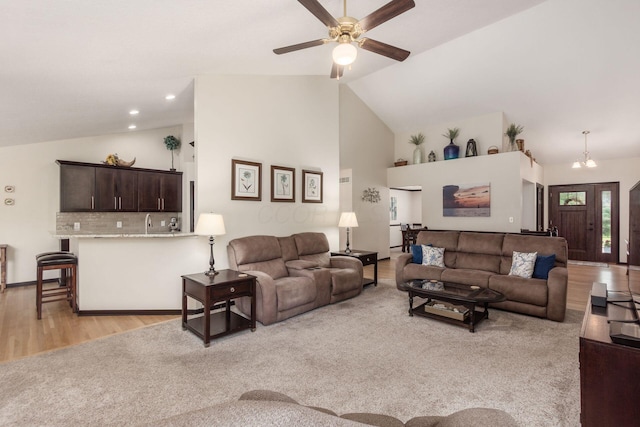 2461 Abbey Knoll Dr, Lewis Center, OH 43035 - living room featuring a ceiling fan, light wood-style flooring, and high vaulted ceiling