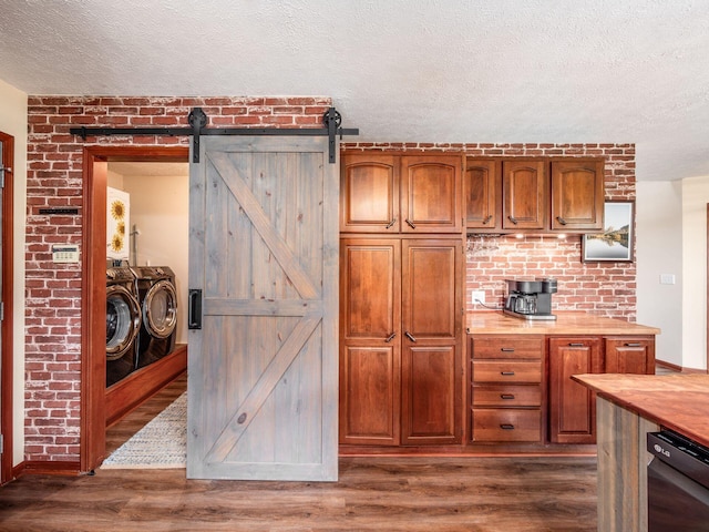 8120 Morgan Rd, West Jefferson, OH 43162 - kitchen with separate washer and dryer, dark wood-style floors, a textured ceiling, dishwasher, and wooden counters