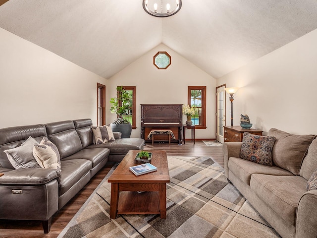 8120 Morgan Rd, West Jefferson, OH 43162 - living area with wood finished floors, lofted ceiling, and a chandelier