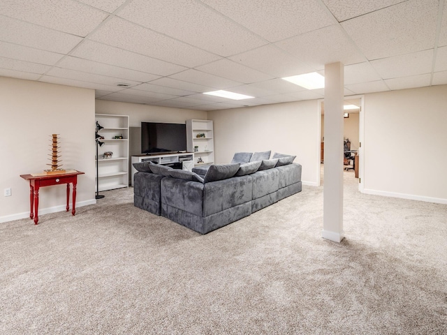 8120 Morgan Rd, West Jefferson, OH 43162 - carpeted living room with a paneled ceiling and baseboards