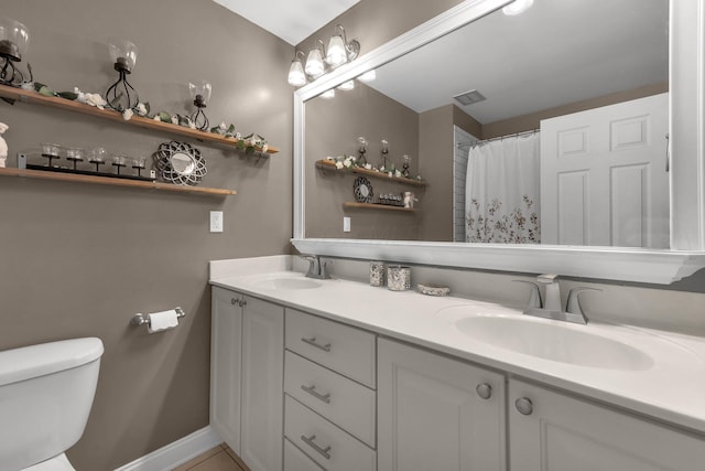 1365 Bluff Ave Unit B, Columbus, OH 43212 - bathroom with double vanity and toilet