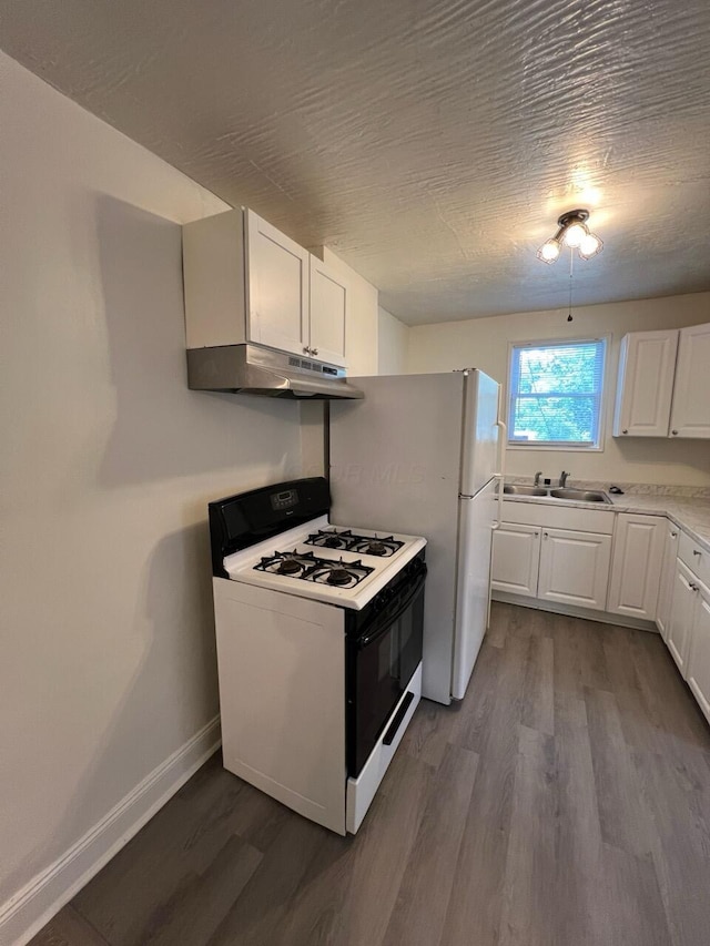 691-693 N Dawson Ave, Columbus, OH 43219 - kitchen featuring gas range, under cabinet range hood, dark wood-style flooring, and white cabinets
