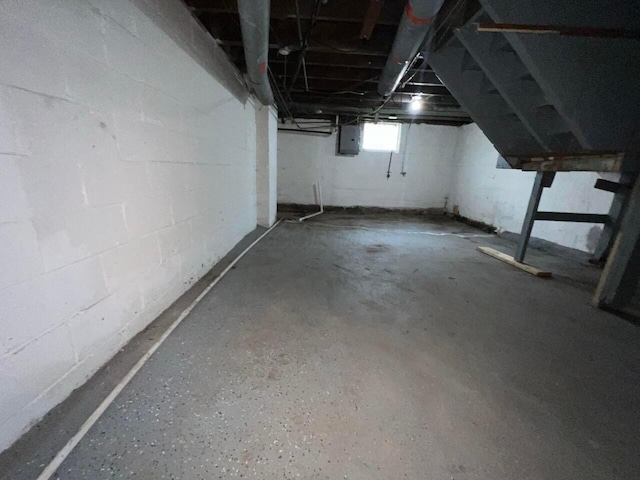 691-693 N Dawson Ave, Columbus, OH 43219 - basement with electric panel and concrete block wall