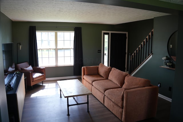 4227 Sestos Dr, Columbus, OH 43207 - living area with a textured ceiling and stairway