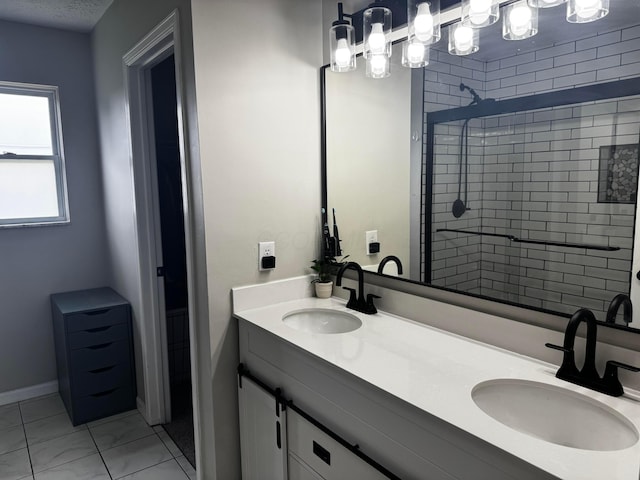 4227 Sestos Dr, Columbus, OH 43207 - full bath featuring double vanity and a tile shower