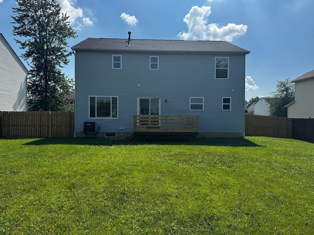 4227 Sestos Dr, Columbus, OH 43207 - back of house with a wooden deck and a fenced backyard