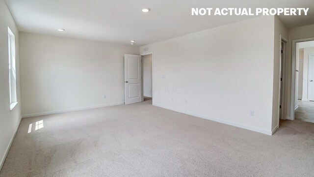 786 Sunny Vale Dr, Delaware, OH 43015 - carpeted spare room with baseboards and recessed lighting