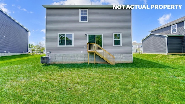 786 Sunny Vale Dr, Delaware, OH 43015 - back of house with a yard and central AC unit
