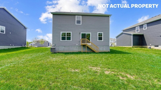 786 Sunny Vale Dr, Delaware, OH 43015 - rear view of property featuring a yard and central AC