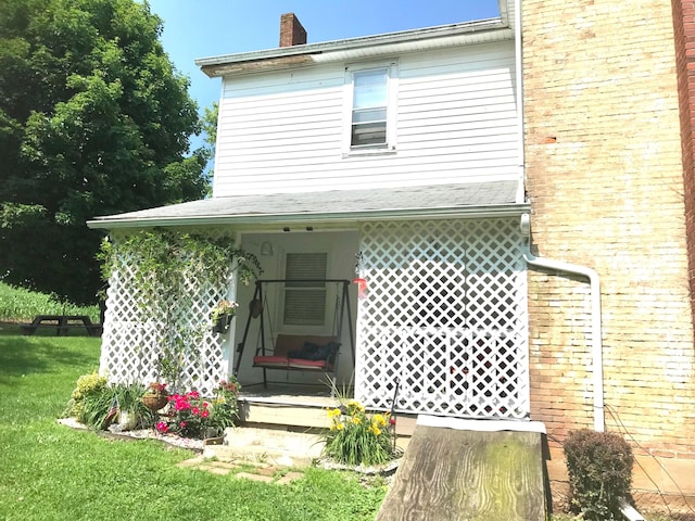 8023 County Road 30, Somerset, OH 43783 - view of front facade featuring a front yard and a chimney