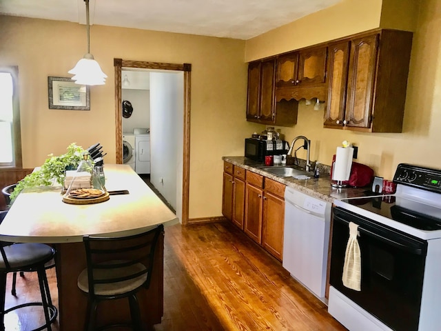 8023 County Road 30, Somerset, OH 43783 - kitchen featuring electric stove, white dishwasher, a sink, dark wood-style floors, and a kitchen island