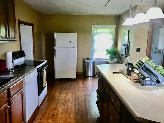 8023 County Road 30, Somerset, OH 43783 - kitchen with white appliances, dark wood-style flooring, and decorative light fixtures