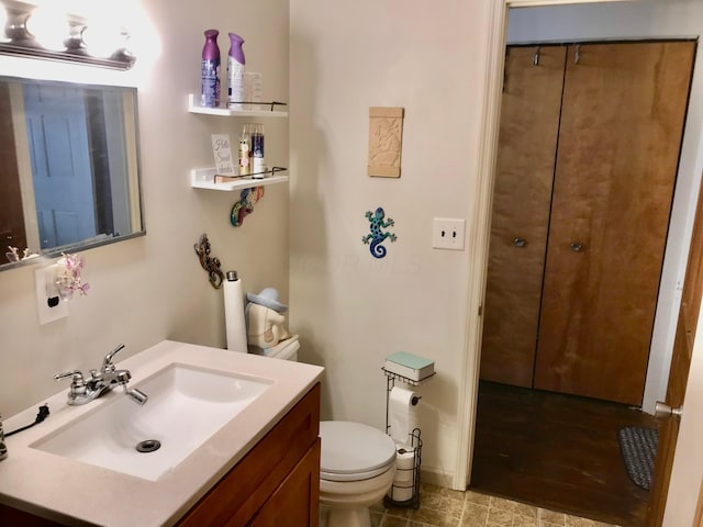 8023 County Road 30, Somerset, OH 43783 - bathroom with toilet and vanity