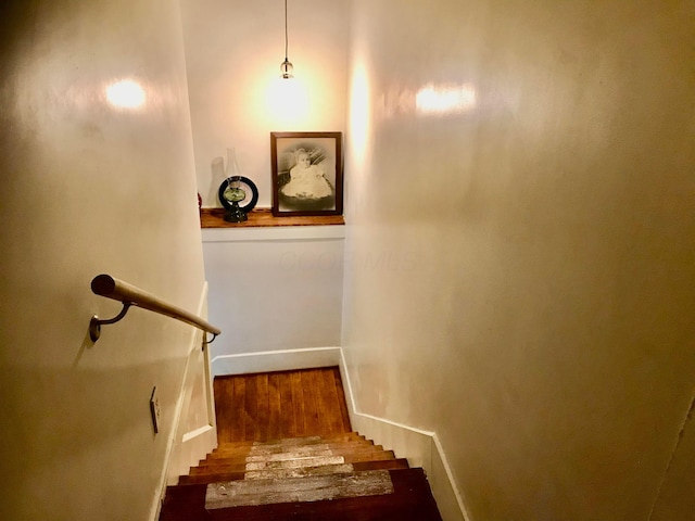 8023 County Road 30, Somerset, OH 43783 - staircase featuring baseboards and wood finished floors