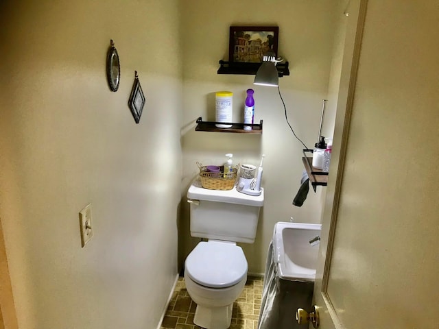8023 County Road 30, Somerset, OH 43783 - half bathroom with toilet and baseboards