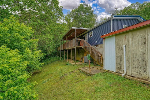 4137 Dry Run Rd, Chillicothe, OH 45601 - view of green lawn with stairs and a wooden deck