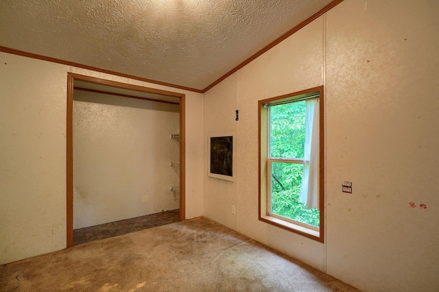 4137 Dry Run Rd, Chillicothe, OH 45601 - carpeted spare room featuring lofted ceiling, a textured ceiling, healthy amount of natural light, and crown molding