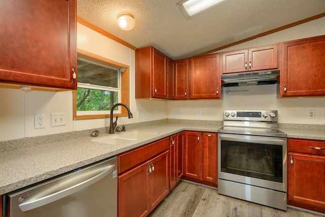 4137 Dry Run Rd, Chillicothe, OH 45601 - kitchen with stainless steel appliances, under cabinet range hood, light wood-style floors, vaulted ceiling, and crown molding