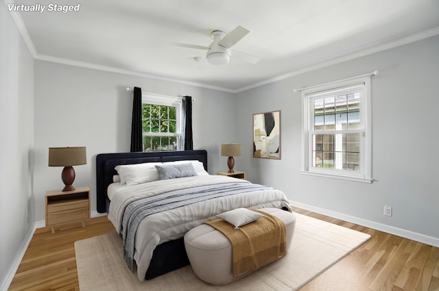33 W Dominion Blvd, Columbus, OH 43214 - bedroom with crown molding, wood finished floors, and a ceiling fan
