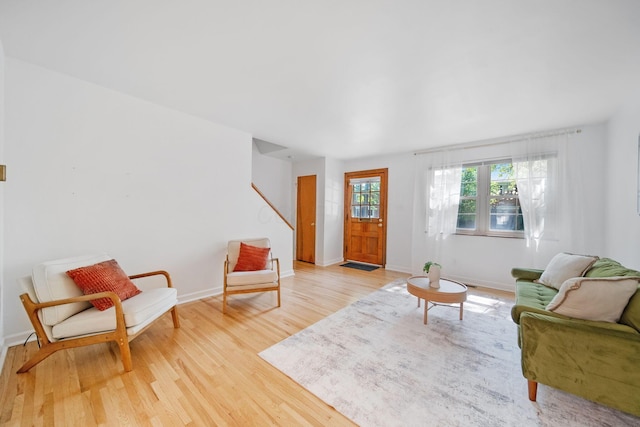 1809 NW Ct Unit C, Columbus, OH 43212 - living room with light wood finished floors and stairs
