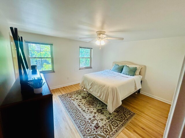1809 NW Ct Unit C, Columbus, OH 43212 - bedroom with light wood-style floors and ceiling fan