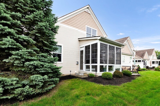 4724 Trademark Trl, Hilliard, OH 43026 - rear view of property featuring a sunroom and a yard