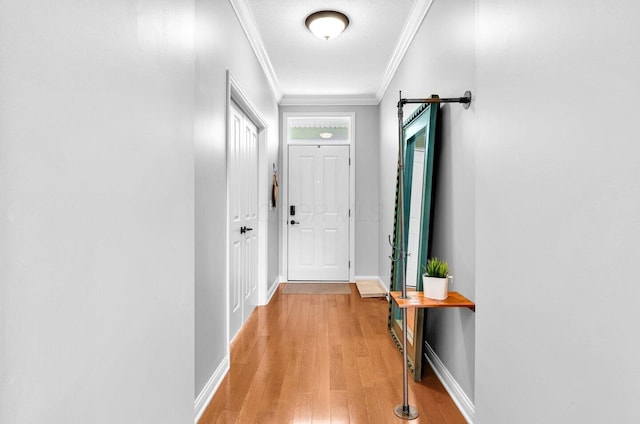 4724 Trademark Trl, Hilliard, OH 43026 - doorway with ornamental molding, light wood-type flooring, and baseboards