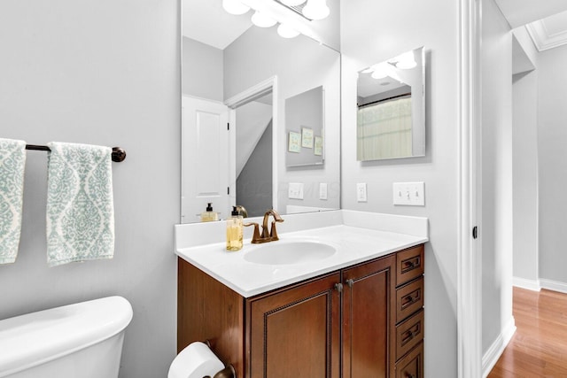 4724 Trademark Trl, Hilliard, OH 43026 - full bath featuring vanity, toilet, and wood finished floors