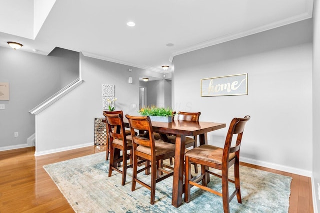 4724 Trademark Trl, Hilliard, OH 43026 - dining space featuring ornamental molding, stairway, light wood-type flooring, baseboards, and recessed lighting
