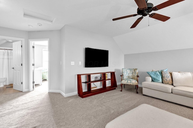 4724 Trademark Trl, Hilliard, OH 43026 - living room featuring attic access, carpet flooring, baseboards, a ceiling fan, and vaulted ceiling