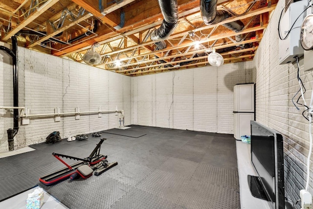 4724 Trademark Trl, Hilliard, OH 43026 - workout area featuring brick wall