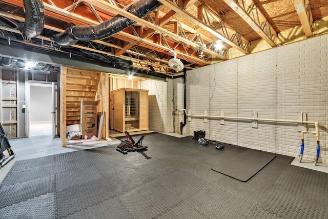 4724 Trademark Trl, Hilliard, OH 43026 - exercise room with brick wall