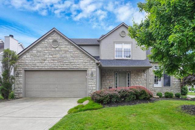 6579 Clay Ct E, Canal Winchester, OH 43110 - view of front facade with stone siding, a garage, driveway, a front yard, and roof with shingles